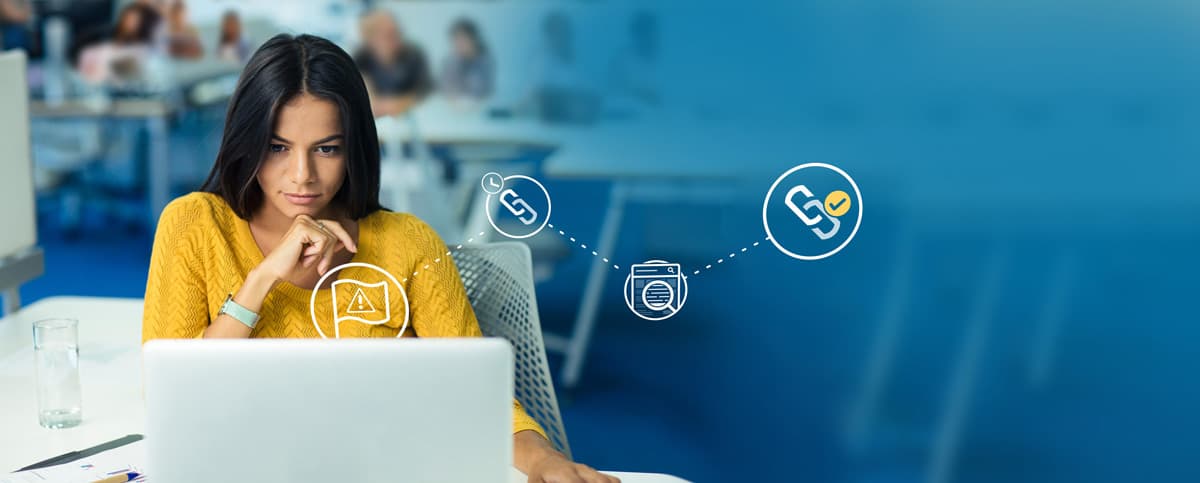 A woman in a yellow sweater gazing contemplatively at a computer screen; illustrated gears float around her.