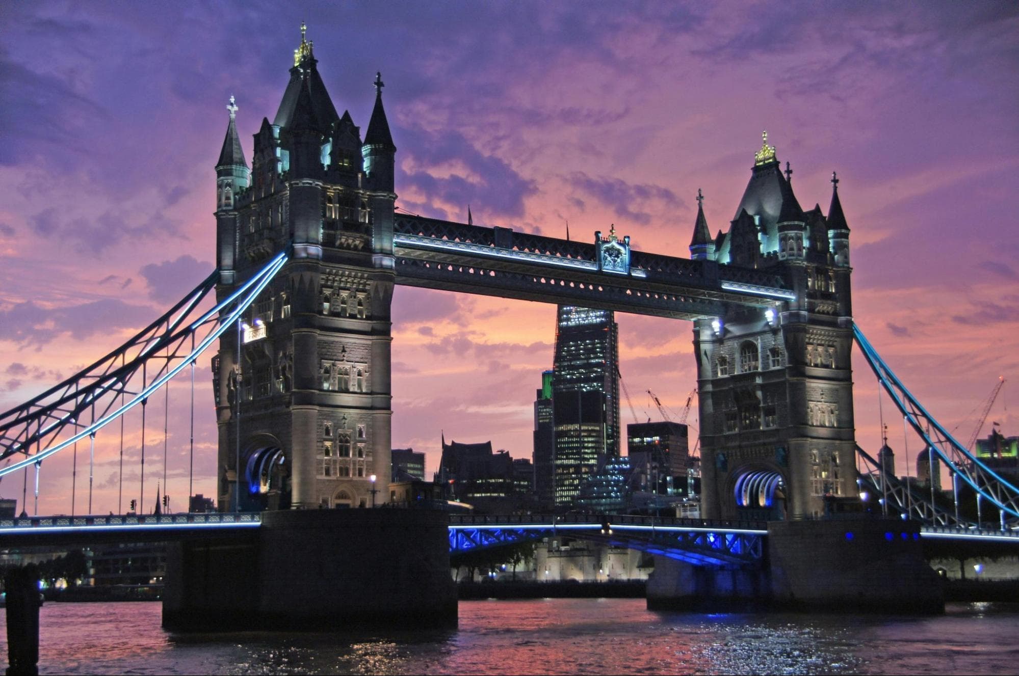 Photograph of the Tower Bridge at night.